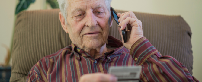 Man-giving-card-information-Senior-Fraud-Prevention