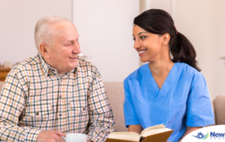 A professional caregiver enjoys her flexible career as she cares for and reads to an older client.