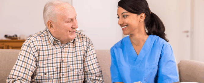 A professional caregiver enjoys her flexible career as she cares for and reads to an older client.