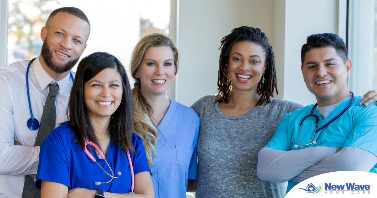 A team of healthcare professionals smiles, representing the many career paths that professional caregiving can lead to.