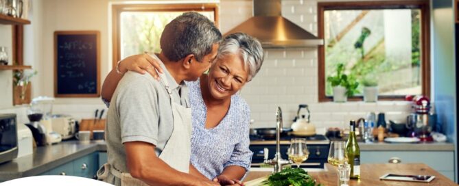 An older couple prepares healthy food together representing National Nutrition Month.
