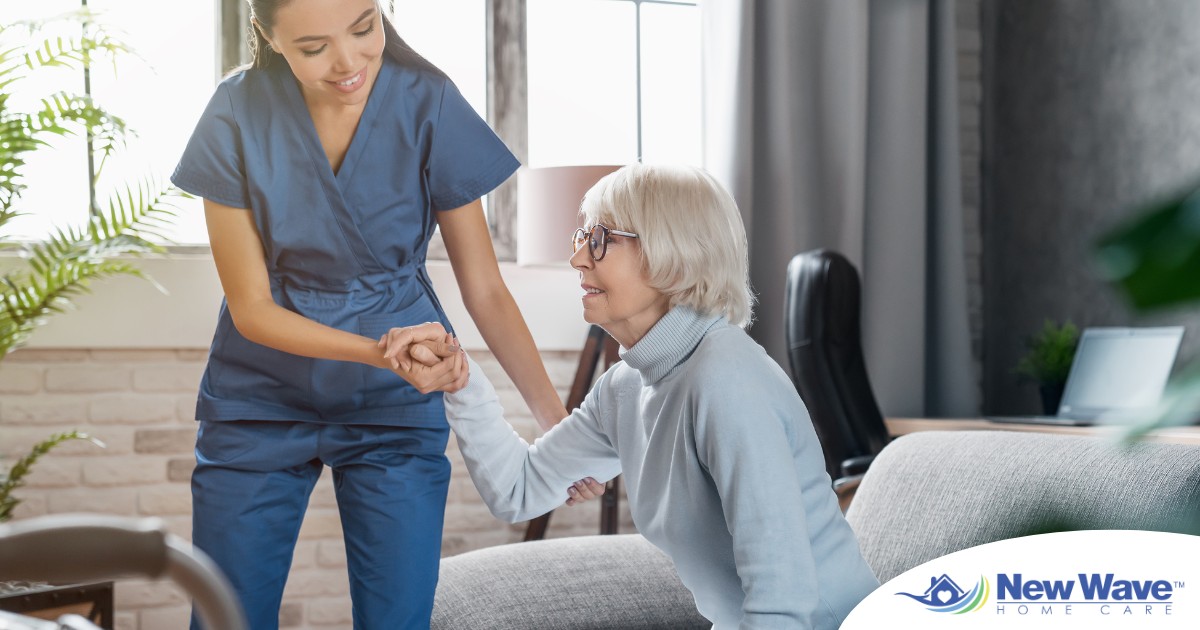 A caregiver demonstrates her caregiver skills by helping an older adult get up.