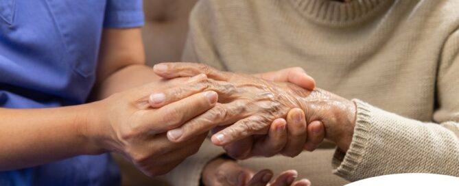 A care provider examines an older adult’s fingers, representing what would happen in an examination for rheumatoid arthritis.