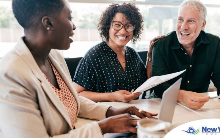 A couple talks with and advisor, representing the type of preparation that is crucial for successful senior care planning.