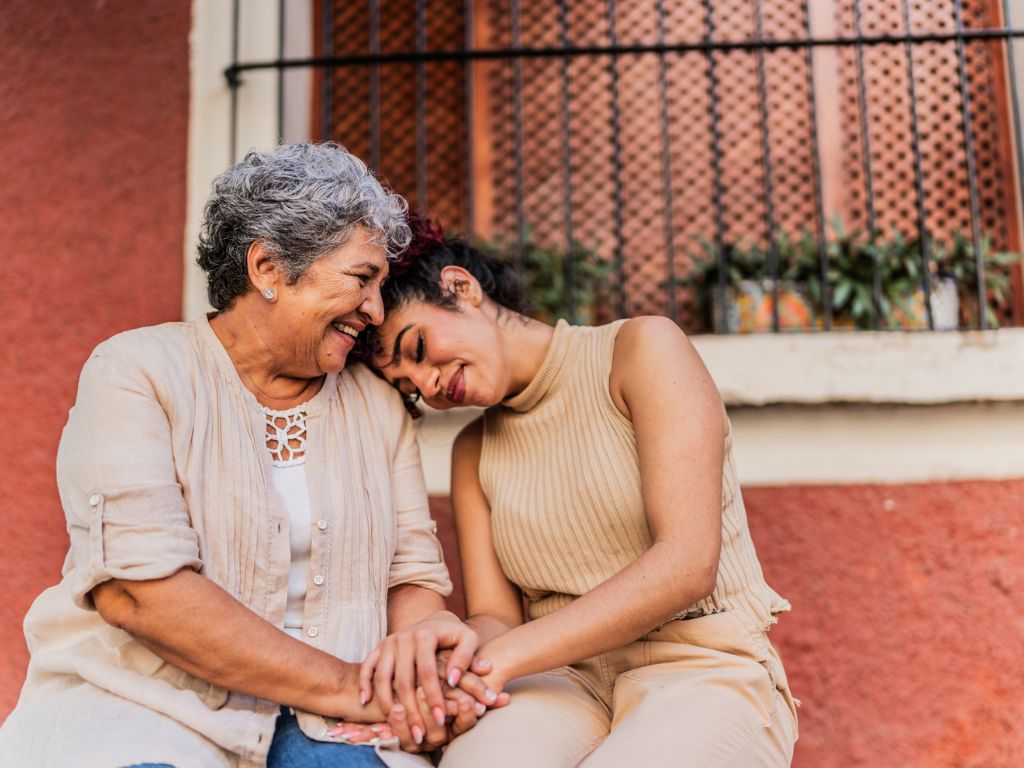 Caregiver and senior woman sharing a warm moment together, representing personal care in Redondo Beach