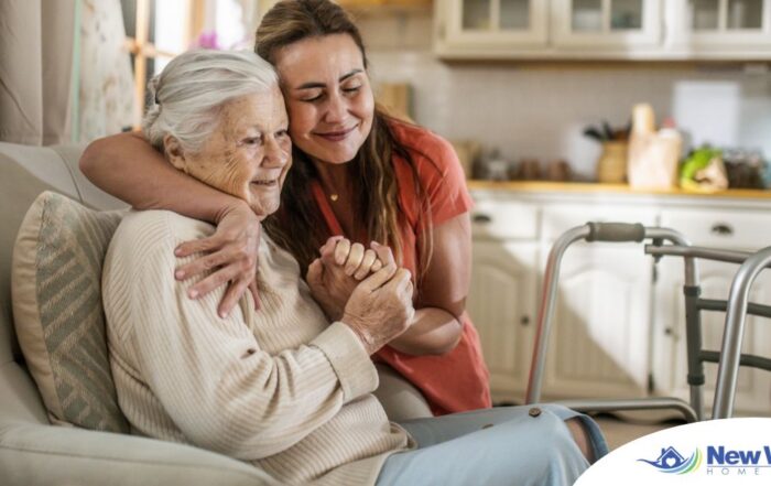 Caregiver supporting an elderly woman in the transition to senior home care