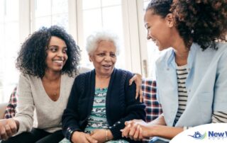 Caregiver talking to a family about Elderly Care